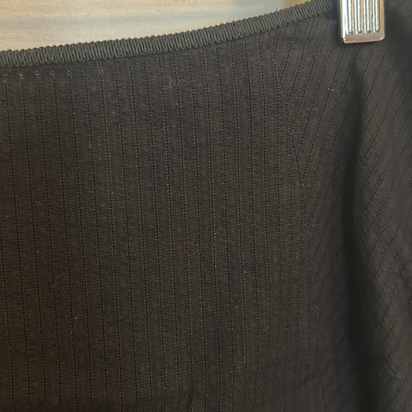 Black asymmetrical skirt with zipper at side and a tie - Picture 3 of 4